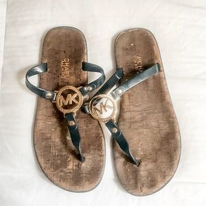 Michael Kors gold logo flip flops sandals